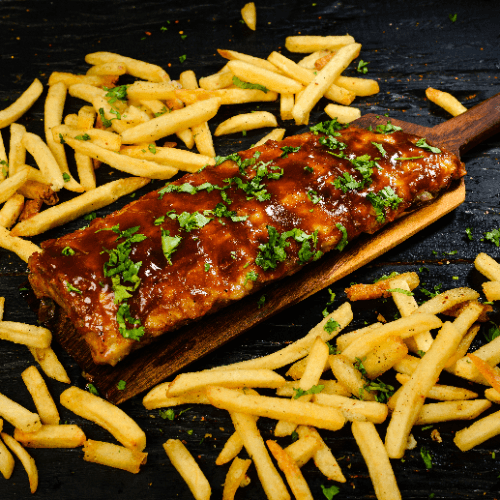 Ribs bbq al ahumador con guarnición